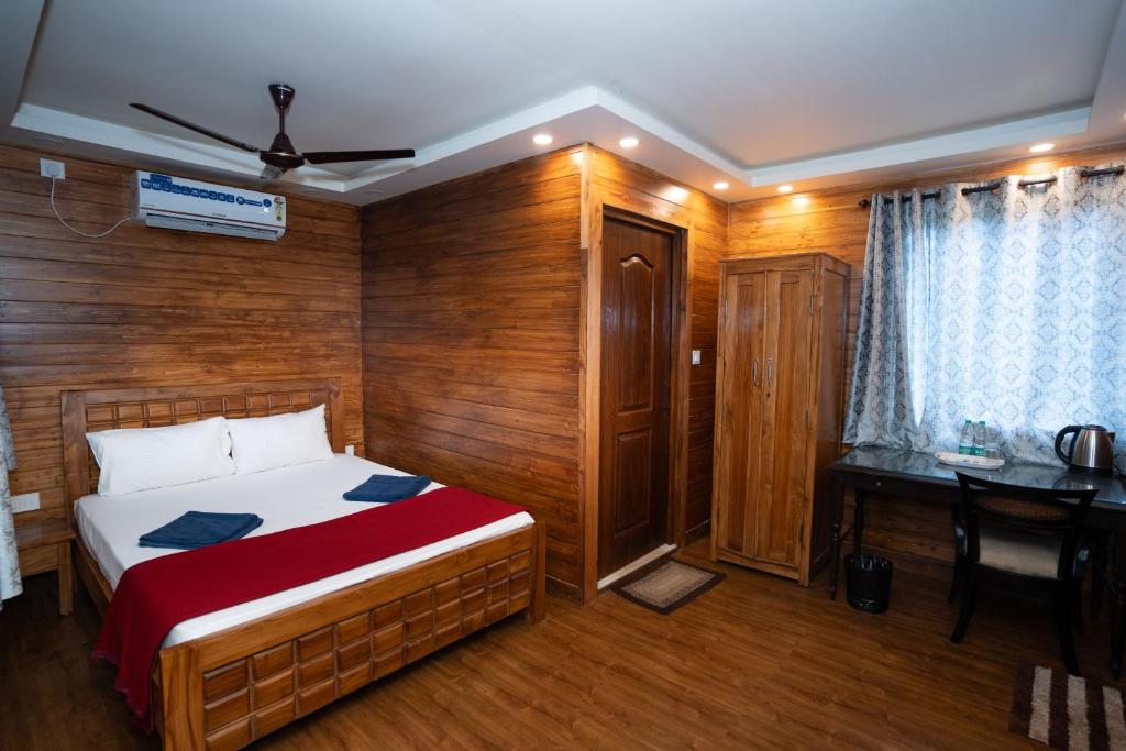 Postel nebo postele na pokoji v ubytování Nasya Beachside Cottages