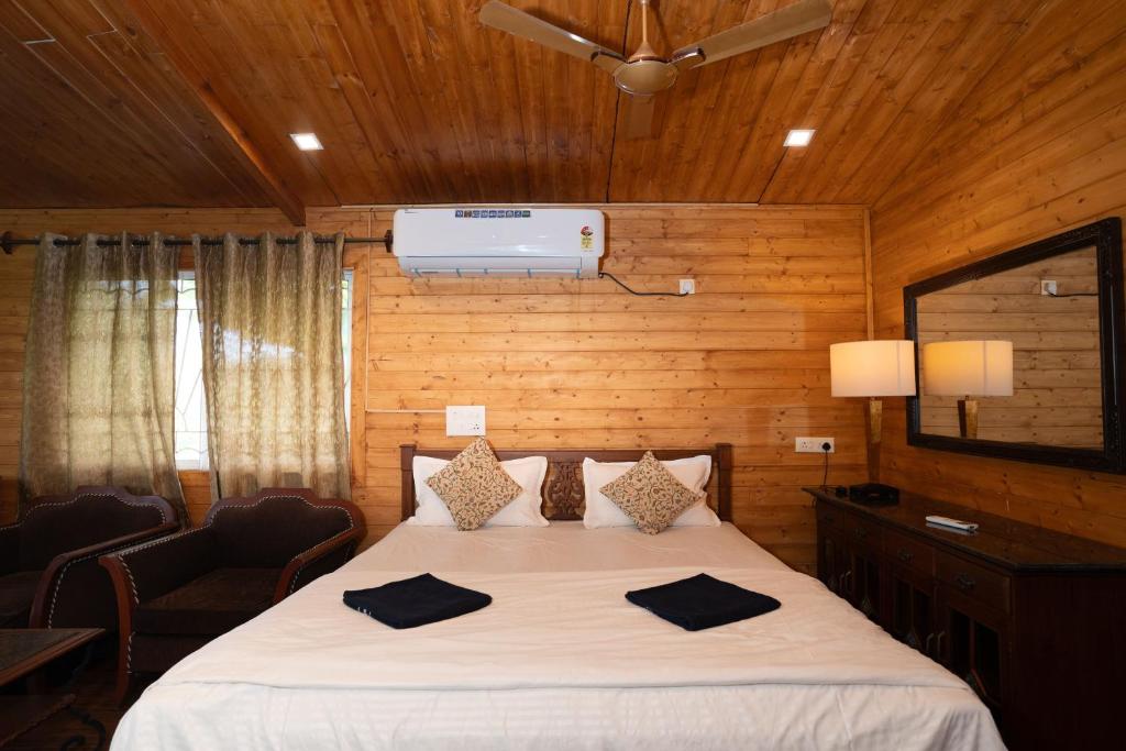 Postel nebo postele na pokoji v ubytování Nasya Beachside Cottages