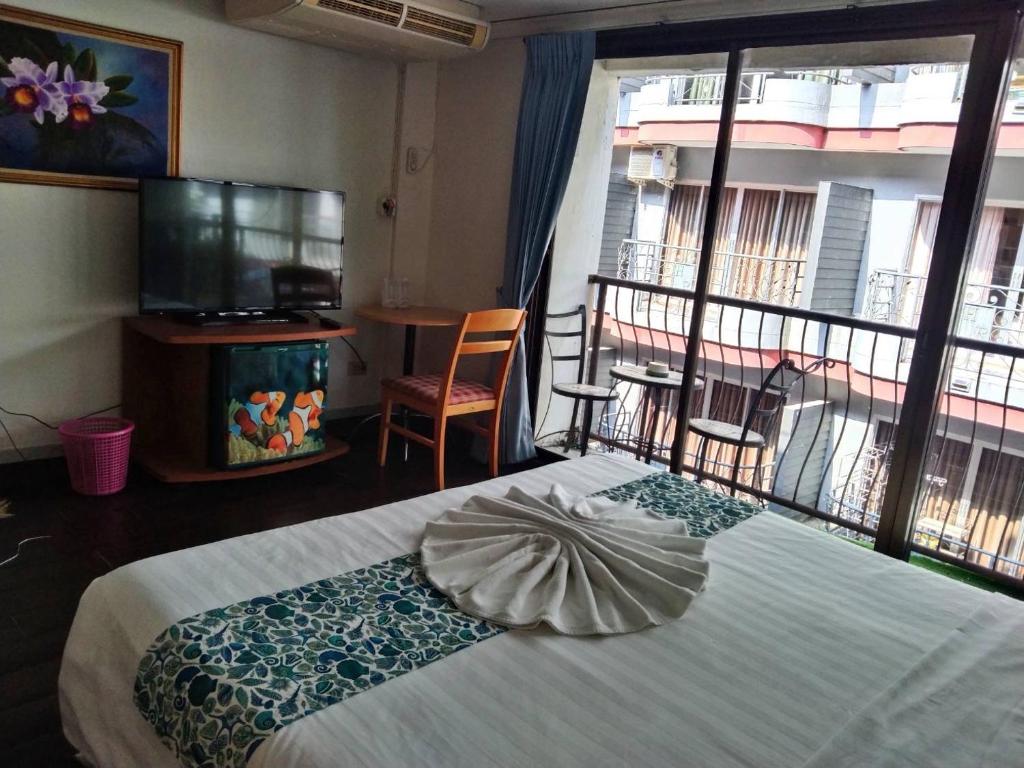 Postel nebo postele na pokoji v ubytování the L Hua Hin