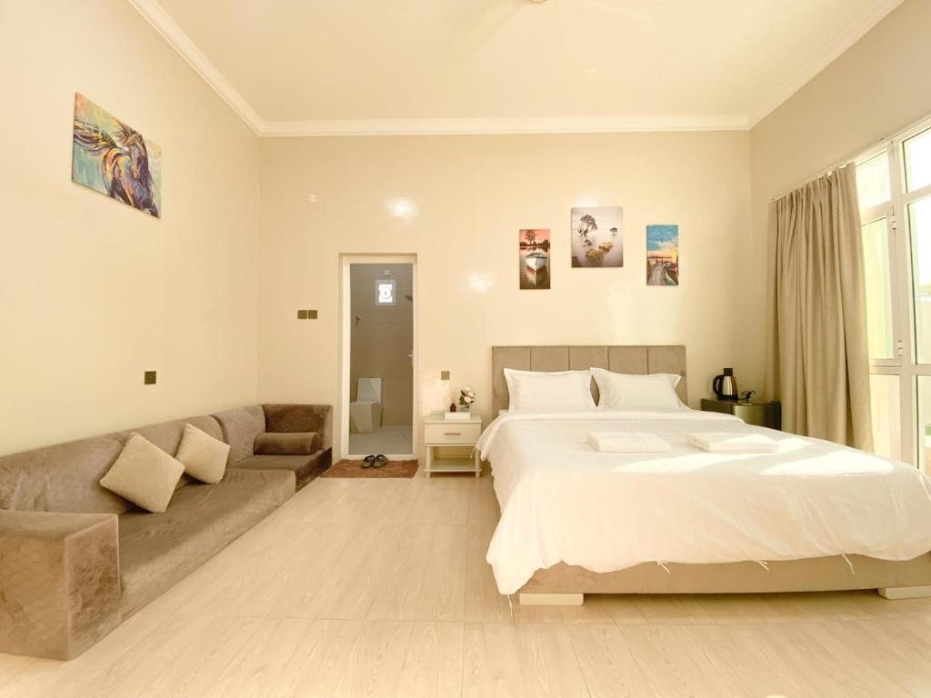 Postel nebo postele na pokoji v ubytování Sea Turtles Guest House