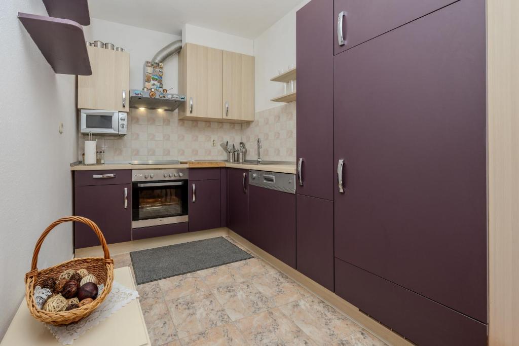 Kuchyňa alebo kuchynka v ubytovaní Apartman Seashell