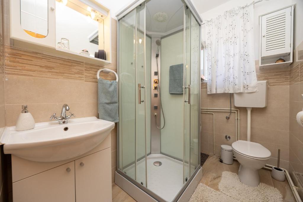 Kúpeľňa v ubytovaní Apartman Seashell