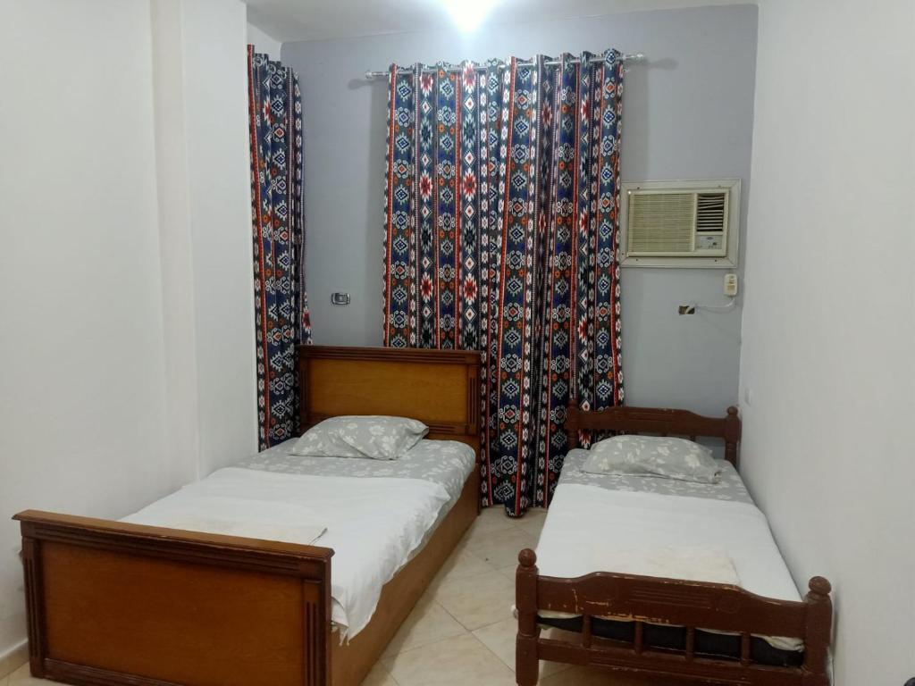 Postel nebo postele na pokoji v ubytování david hostel