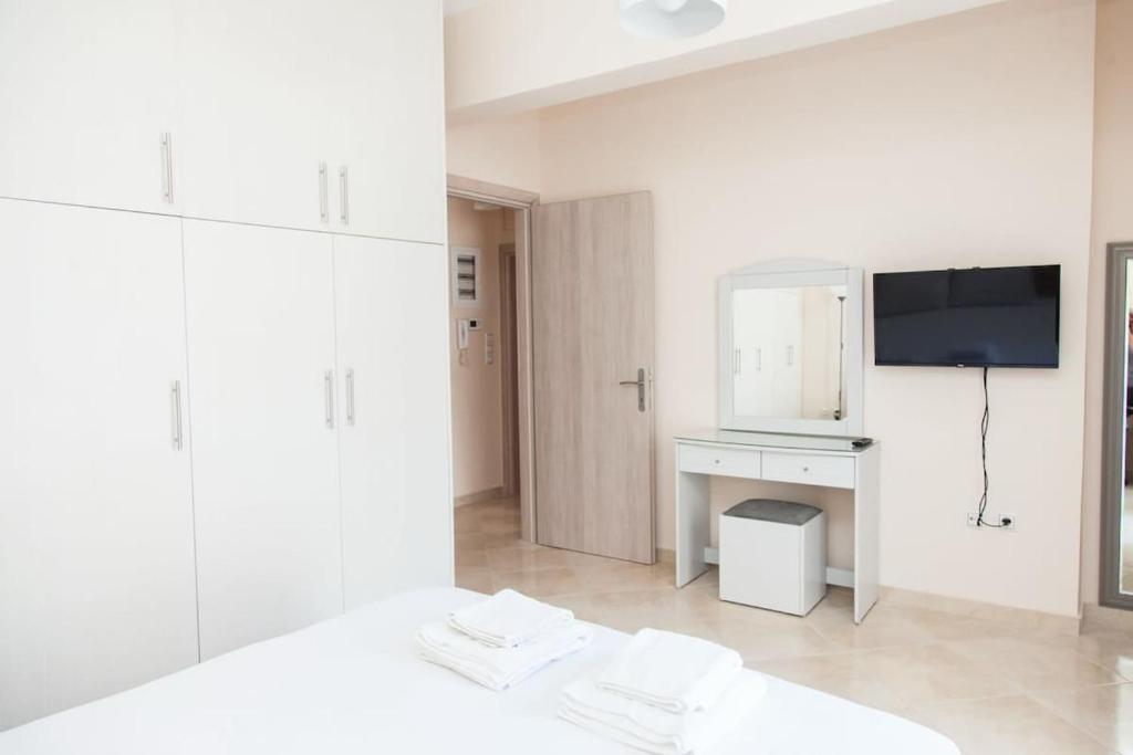 TV a/nebo společenská místnost v ubytování Great Apartment in Piraeus