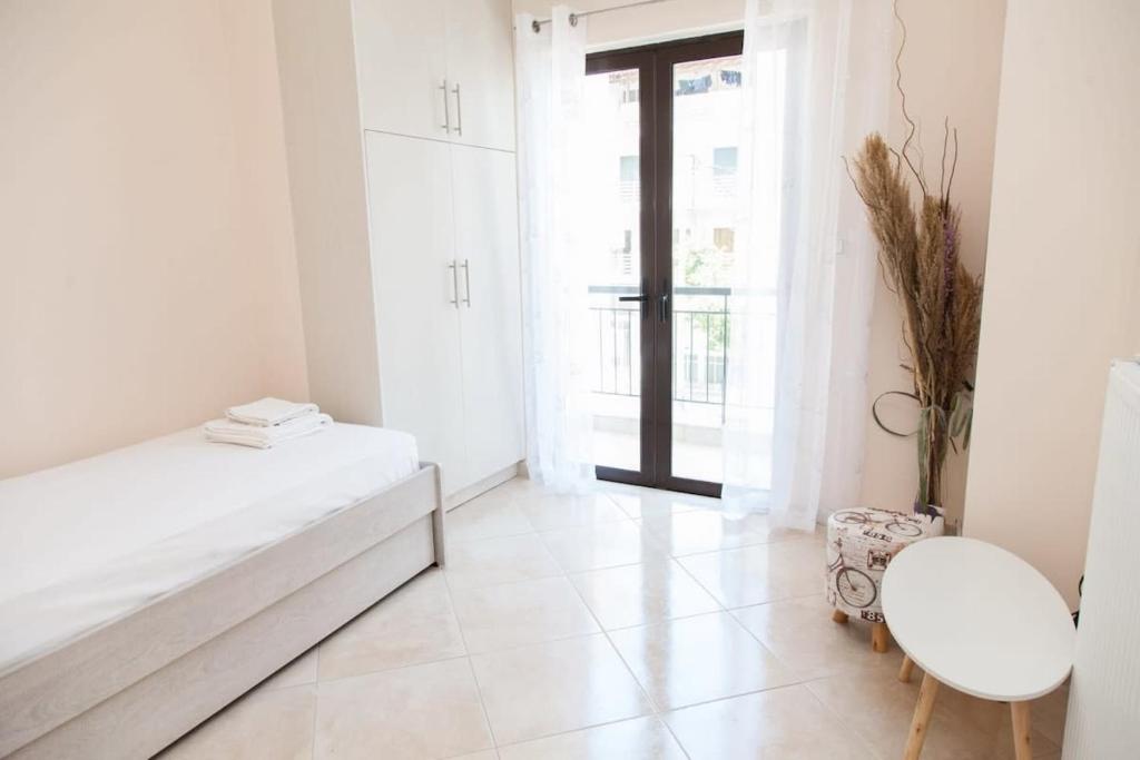 Postel nebo postele na pokoji v ubytování Great Apartment in Piraeus