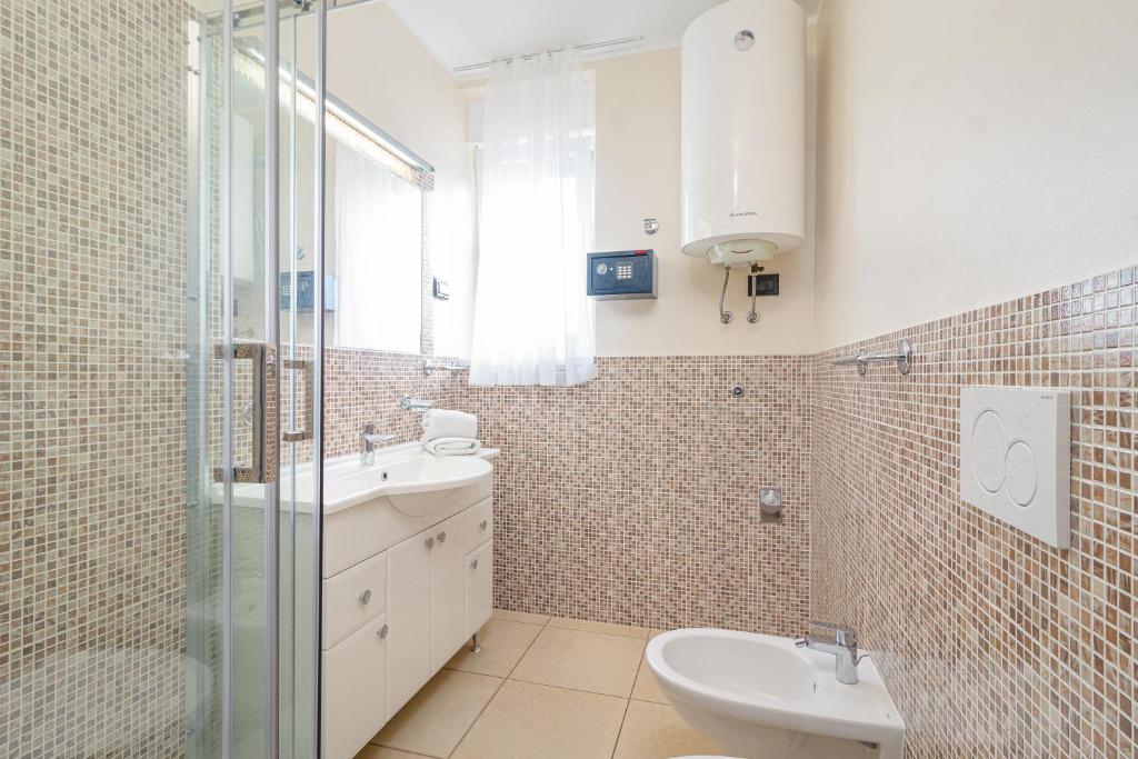 Koupelna v ubytování Residence Kamenjak Runke