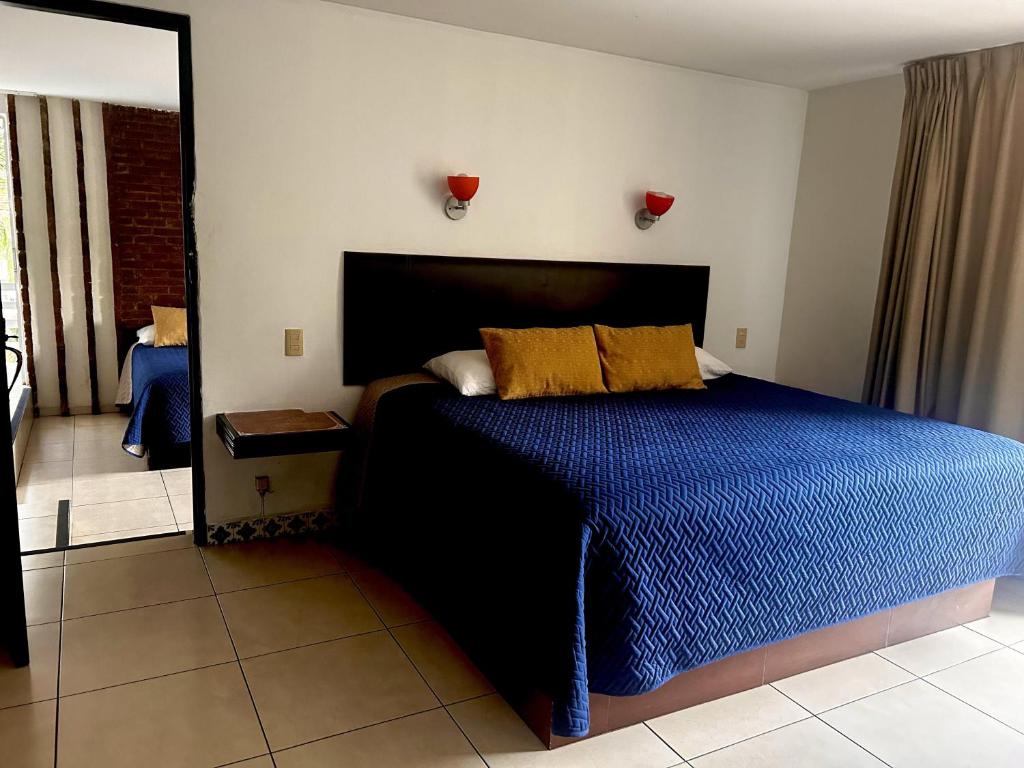 Postel nebo postele na pokoji v ubytování VF Villa Florencia Hotel