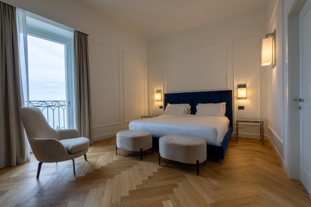 Postel nebo postele na pokoji v ubytování Bluonly Boutique B&B