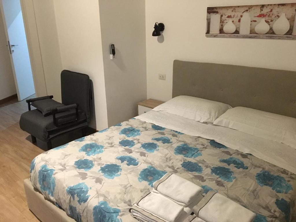 A bed or beds in a room at Largo Otranto - Guest House