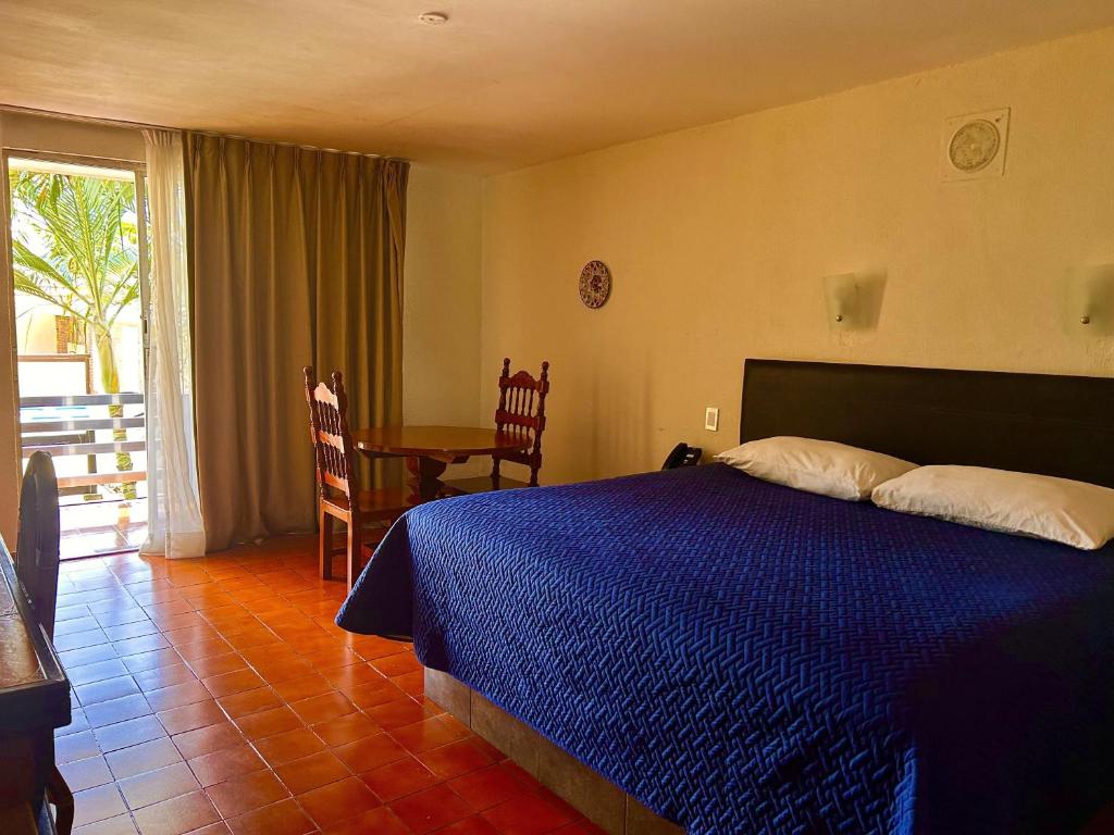 Postel nebo postele na pokoji v ubytování VF Villa Florencia Hotel