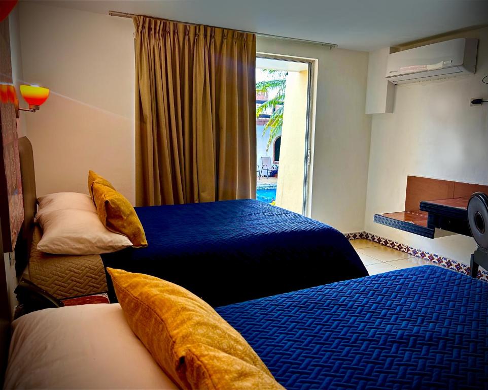 Postel nebo postele na pokoji v ubytování VF Villa Florencia Hotel