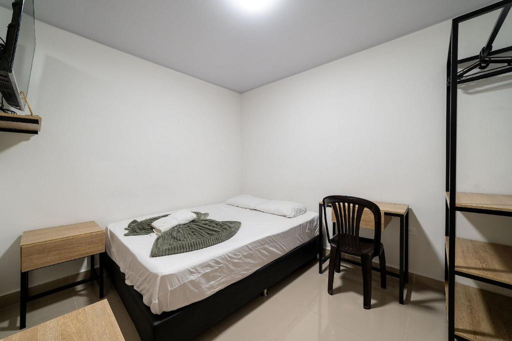 Postel nebo postele na pokoji v ubytování Hotel Doxa