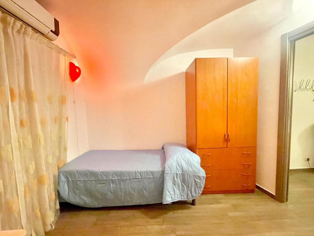 Posteľ alebo postele v izbe v ubytovaní Catania Central Flat