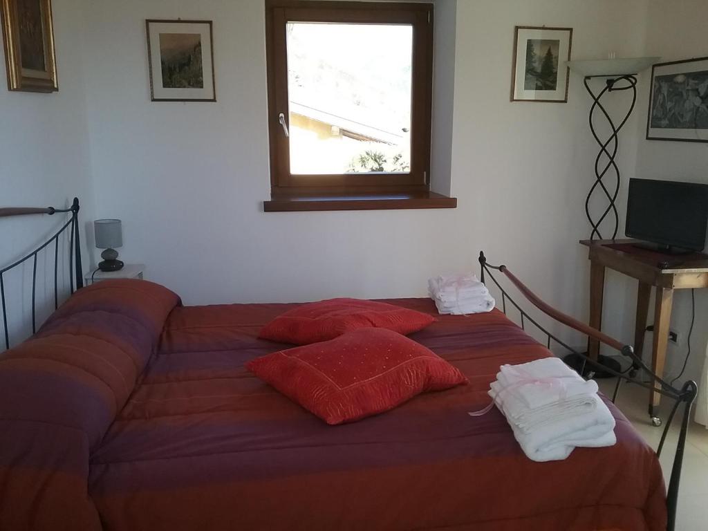 Postel nebo postele na pokoji v ubytování B&B Le tre chiavi