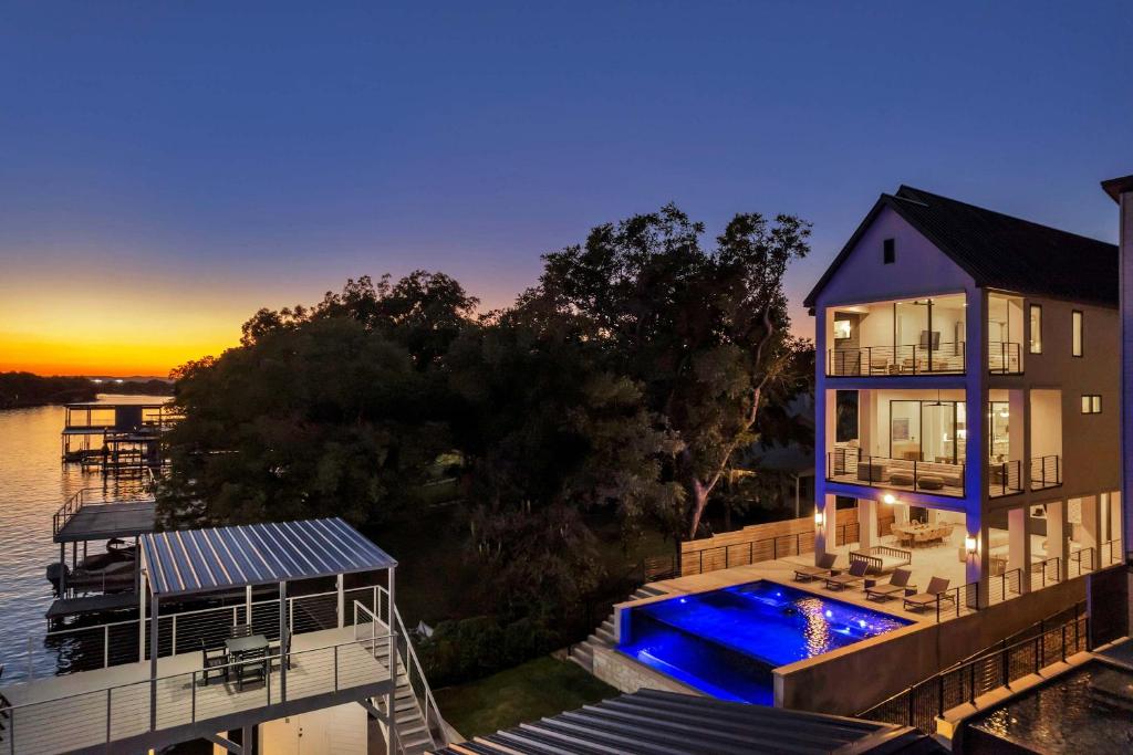 an aerial view of a house on the water at Ellen Lake Luxe with Concierge Services in Kingsland