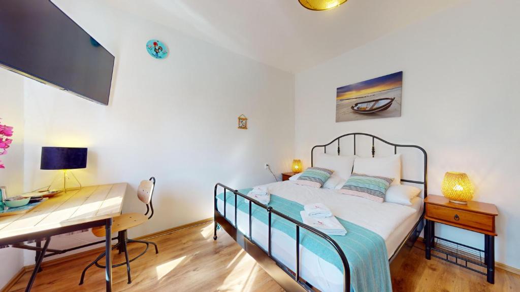 A bed or beds in a room at Ron De Mar - ES TRENC