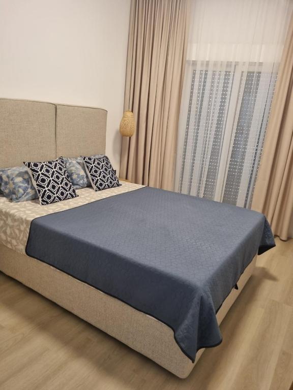 Postel nebo postele na pokoji v ubytování Sunrise condo