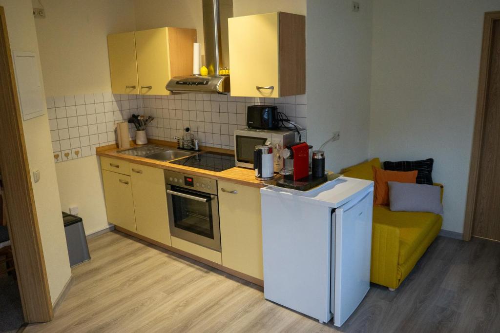 Kuchyň nebo kuchyňský kout v ubytování Ferienwohnung Eifel-Nest