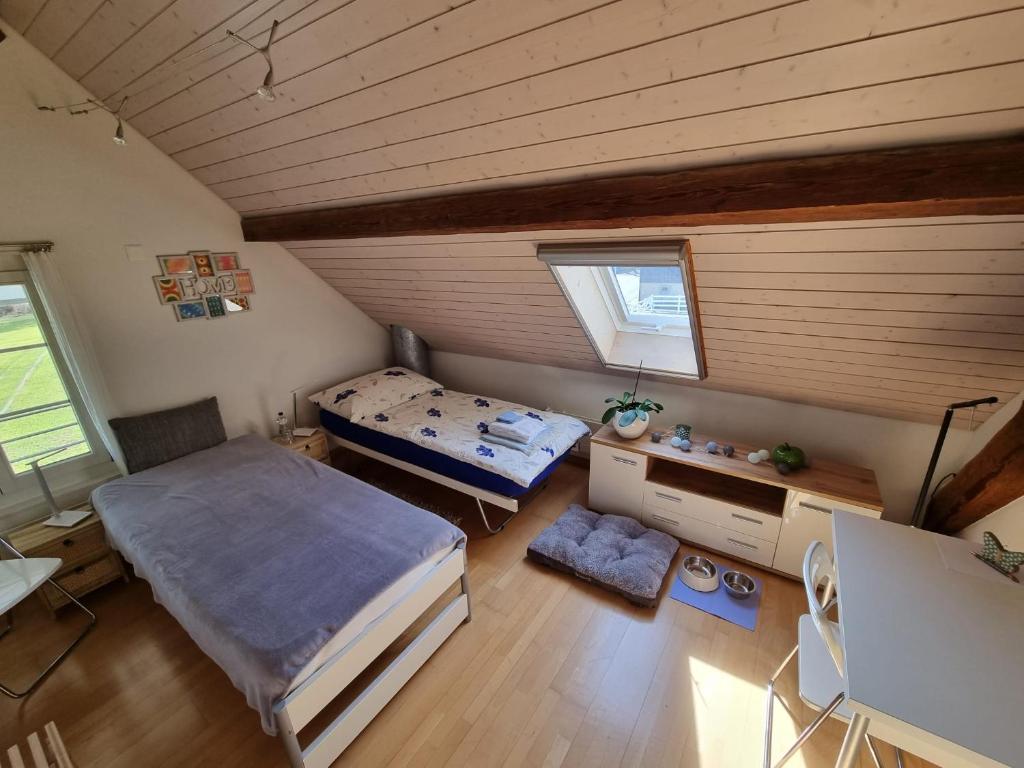 Postel nebo postele na pokoji v ubytování BnB Lindenacker