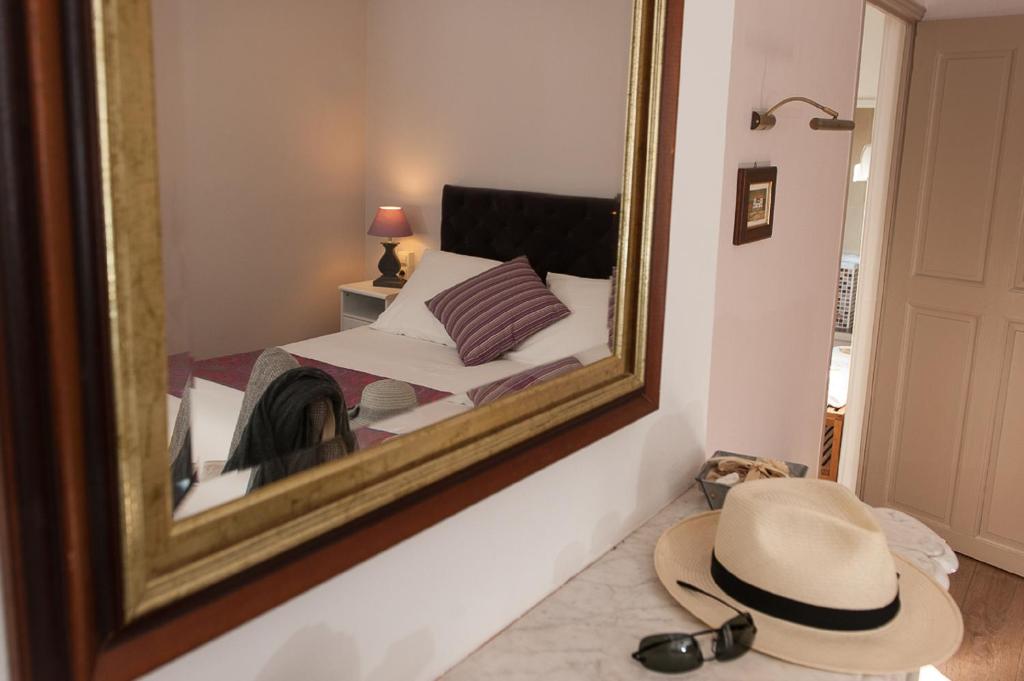 Postel nebo postele na pokoji v ubytování Hotel Sainte Anne - Apt