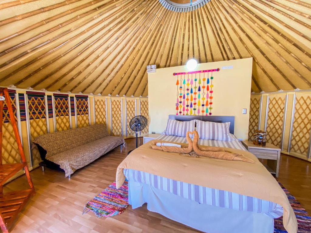 Uma cama ou camas num quarto em Altos de Quitor, Glamping