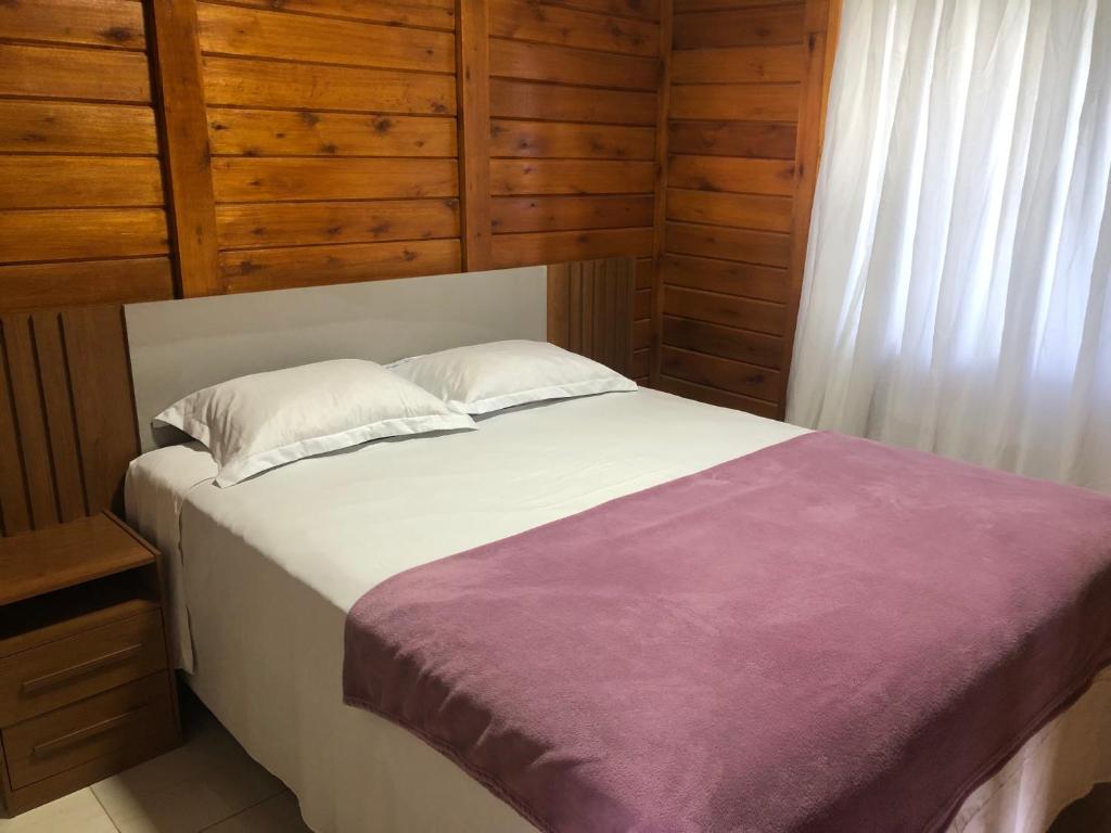Postel nebo postele na pokoji v ubytování Chalé Vale dos Sonhos