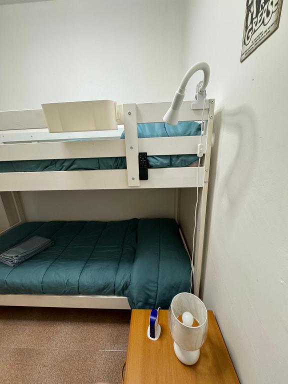 A bed or beds in a room at ALGHERO SUN & SEA - Spiaggia a 50 metri