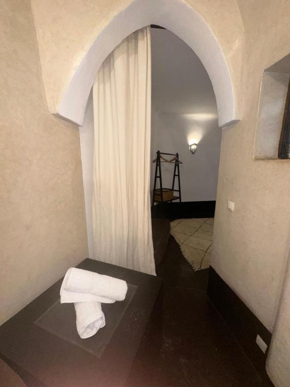 Postel nebo postele na pokoji v ubytování dar kenza