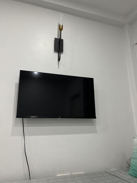 TV i/ili multimedijalni sistem u objektu Secret Haven