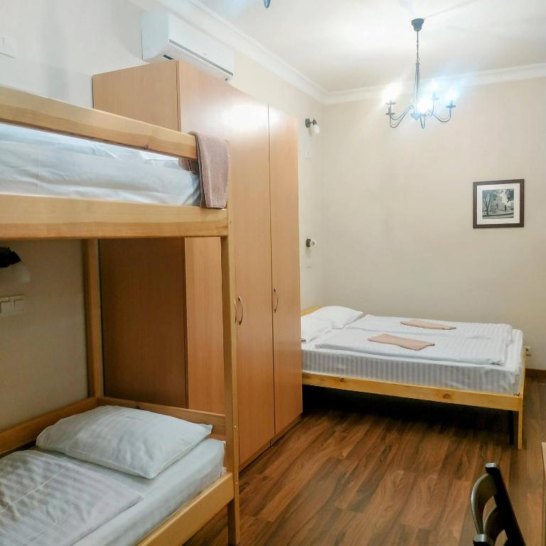 Postel nebo postele na pokoji v ubytování Belokorichi