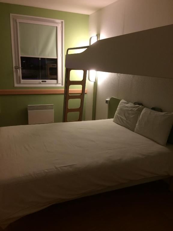 Postel nebo postele na pokoji v ubytování Ibis budget Verdun