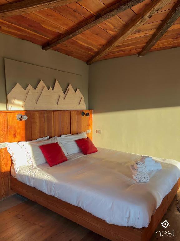 Postel nebo postele na pokoji v ubytování Nest Hotel Sestriere