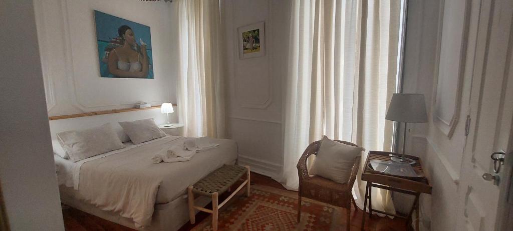Cama ou camas em um quarto em Casarão AL