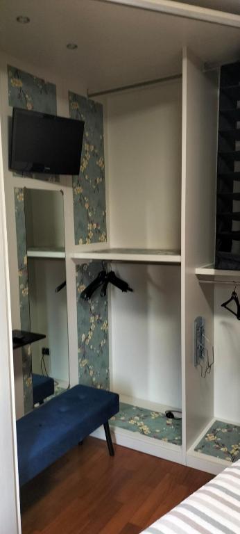 TV a/nebo společenská místnost v ubytování Casa Azalea