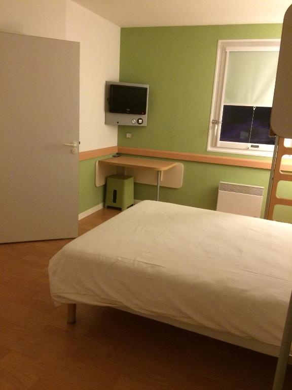 Postel nebo postele na pokoji v ubytování Ibis budget Verdun