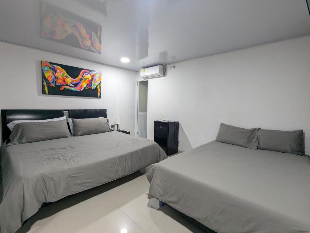 Postel nebo postele na pokoji v ubytování HOTEL LIGHT PLAZA