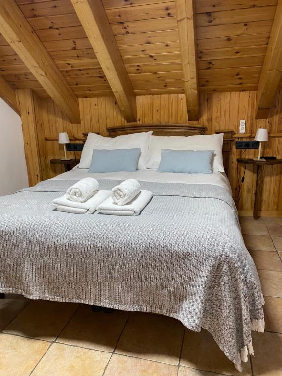 Postel nebo postele na pokoji v ubytování Apartamentos Fogaron