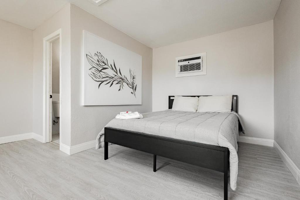Postel nebo postele na pokoji v ubytování G Hotel