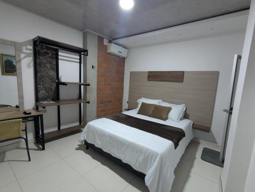 Postel nebo postele na pokoji v ubytování HOTEL LIGHT PLAZA