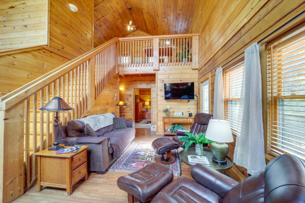 a living room with a couch and chairs in a cabin at 8 Mi to Appalachian Ski! Mtn-View Gem on 22 Acres in Lenoir
