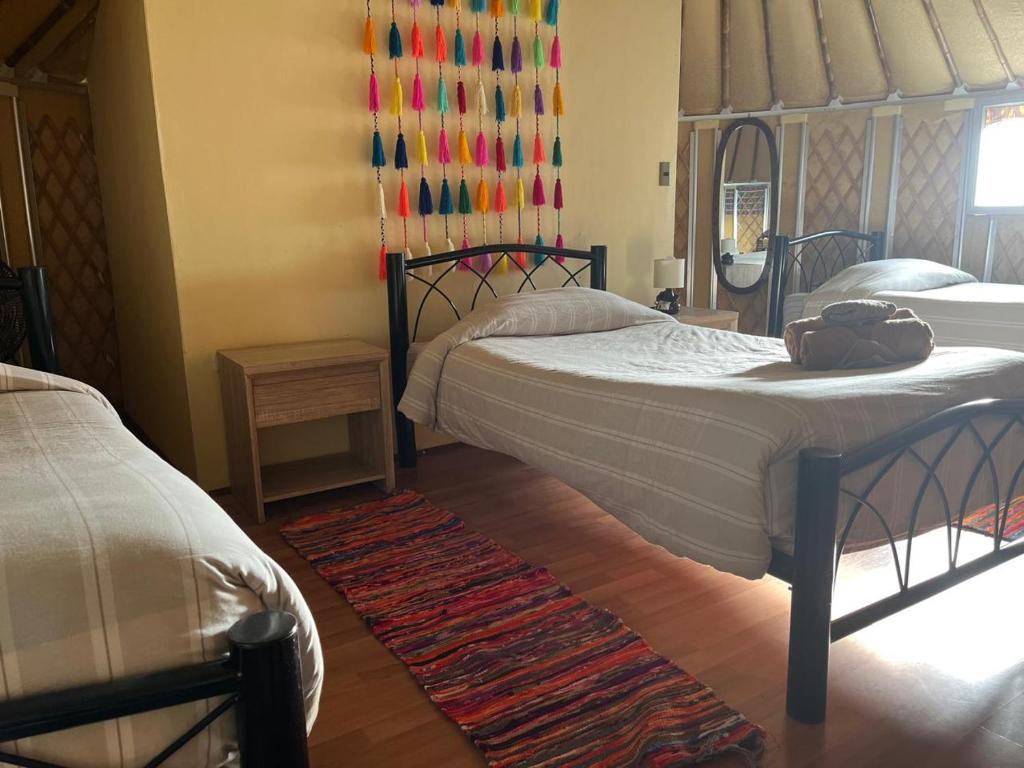 Uma cama ou camas num quarto em Altos de Quitor, Glamping