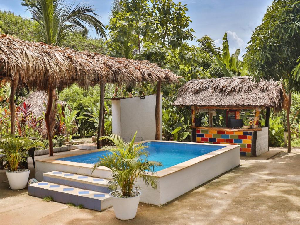 Bazén v ubytování Eco Hotel Amanecer Tayrona nebo v jeho okolí