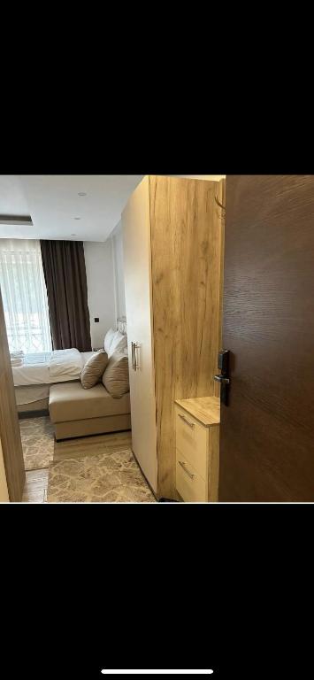 Postel nebo postele na pokoji v ubytování Nikola Residence Hill