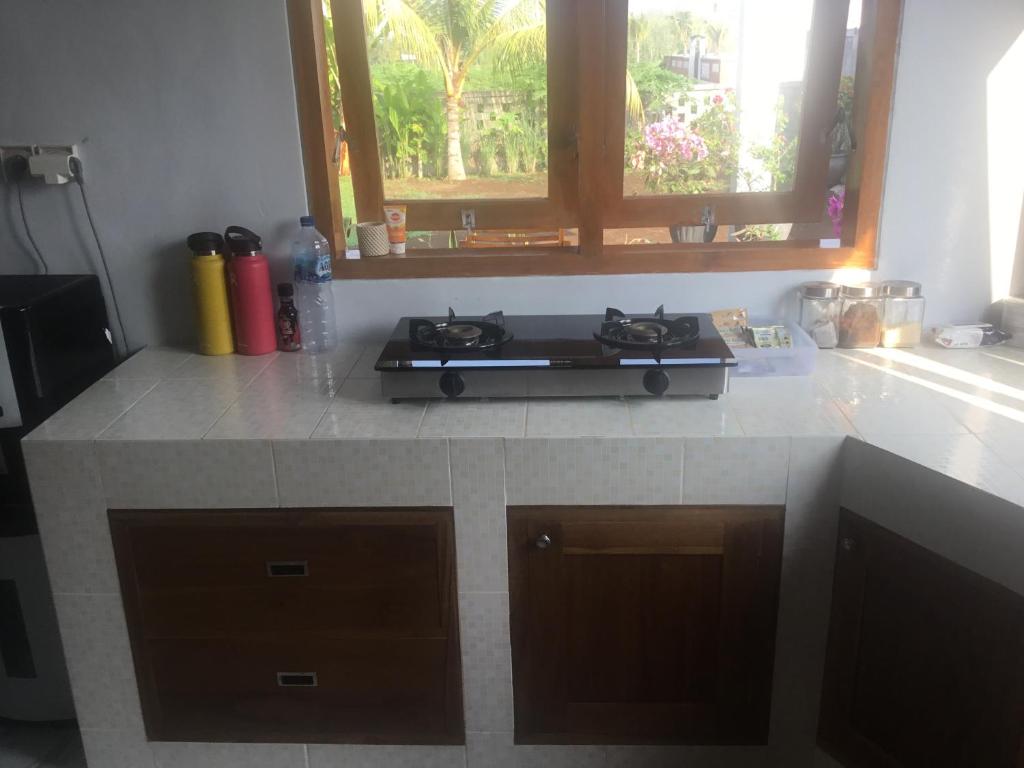 Kuchyň nebo kuchyňský kout v ubytování Geyu House