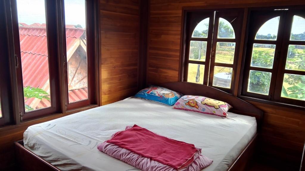 Postel nebo postele na pokoji v ubytování Tibet Restaurant and Hostel