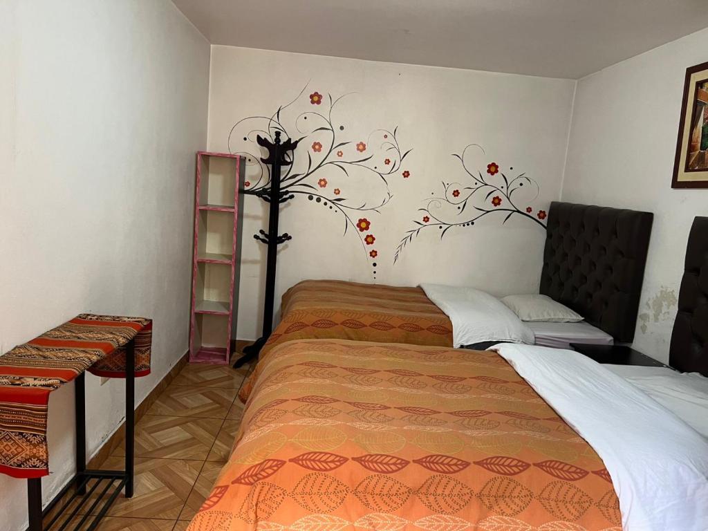 Postel nebo postele na pokoji v ubytování Redys House