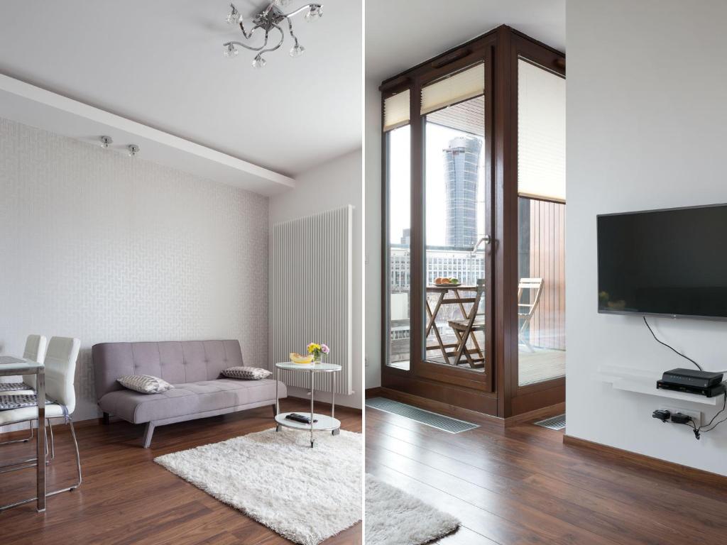 Televízia a/alebo spoločenská miestnosť v ubytovaní Chopin Apartments - City