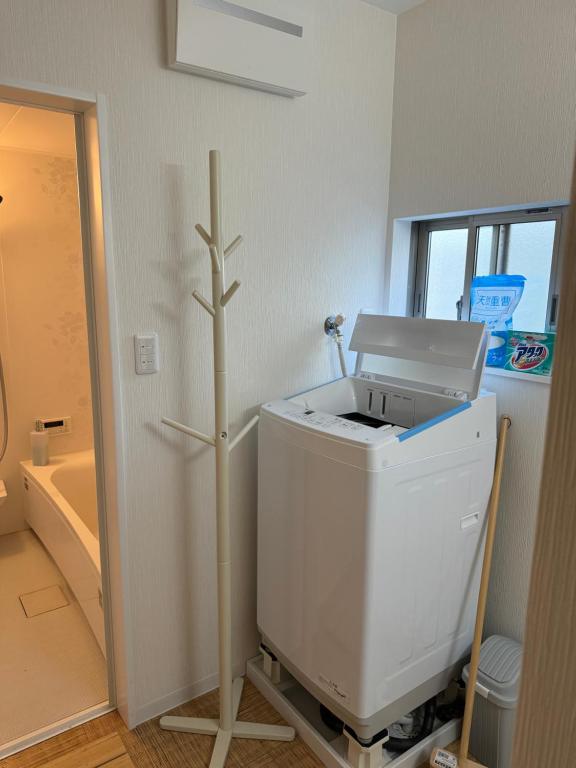 Koupelna v ubytování Self check-in Hostel 5mins from JR Nishi Hiro station