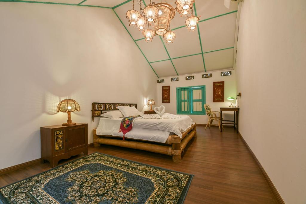 Postel nebo postele na pokoji v ubytování Ohana House @ 15 Kuli