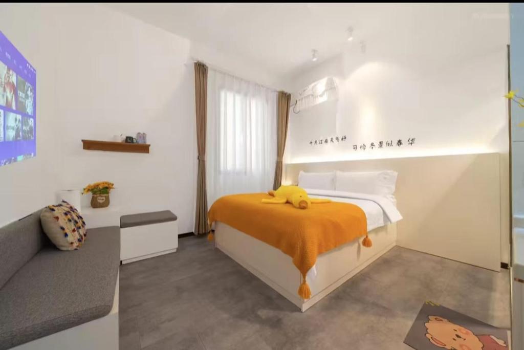 Postel nebo postele na pokoji v ubytování Xiamen Mingshu Shanqiu Homestay